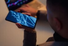 1784831245 man uses phone