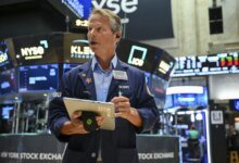 Wall Street and Global Stocks Slump as Oil Surges