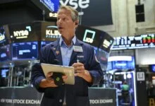 Wall Street and Global Stocks Slump as Oil Surges
