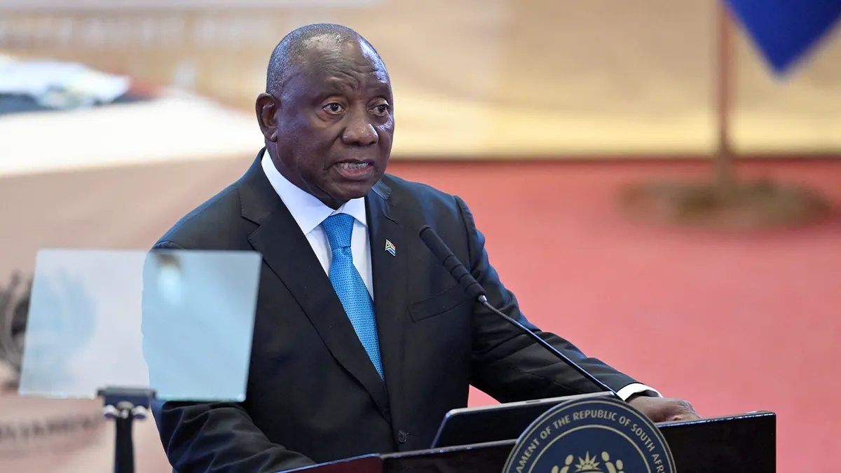 Over 160,000 Foreign Nationals Leave South Africa as Anti-Immigration Demonstrations and Political Pressure Mount 5 South Africa’s president speaks at a podium inside the parliamentary chamber during a nationally televised address.