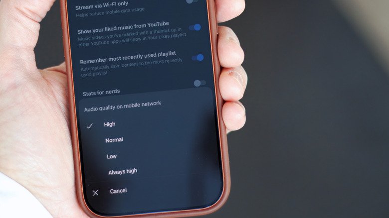 How to Unlock the Highest Audio Quality Settings on YouTube Music 2 Closeup of an iPhone, showing the streaming quality menu in the YouTube Music app