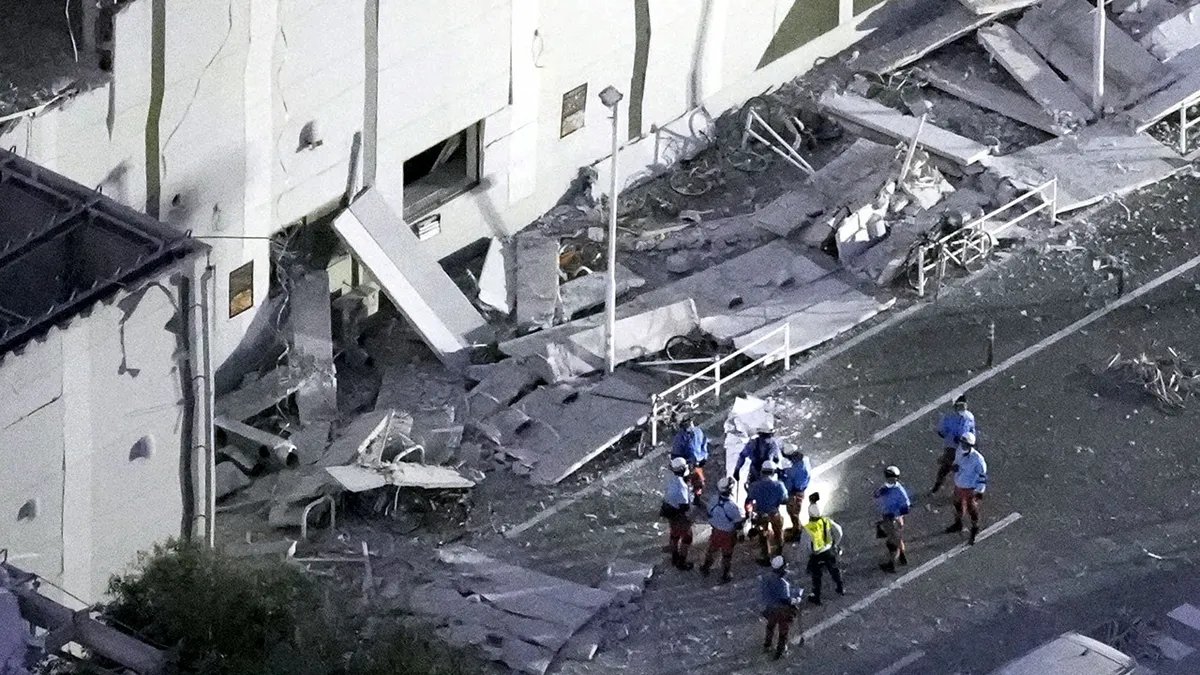 An aerial view shows rescue workers conducting a search and rescue operation at the damaged Aeon Mall shopping centre, where, according to local media, an explosion occurred after an earthquake with a preliminary magnitude of 7.1 struck Japan's southern Kumamoto prefecture, in Kashima Town, Kumamoto Prefecture, Japan, July 28, 2026. Kyodo/via REUTERS ATTENTION EDITORS - THIS IMAGE HAS BEEN SUPPLIED BY A THIRD PARTY. MANDATORY CREDIT. JAPAN OUT. NO COMMERCIAL OR EDITORIAL SALES IN JAPAN. TPX IMAGES OF THE DAY
