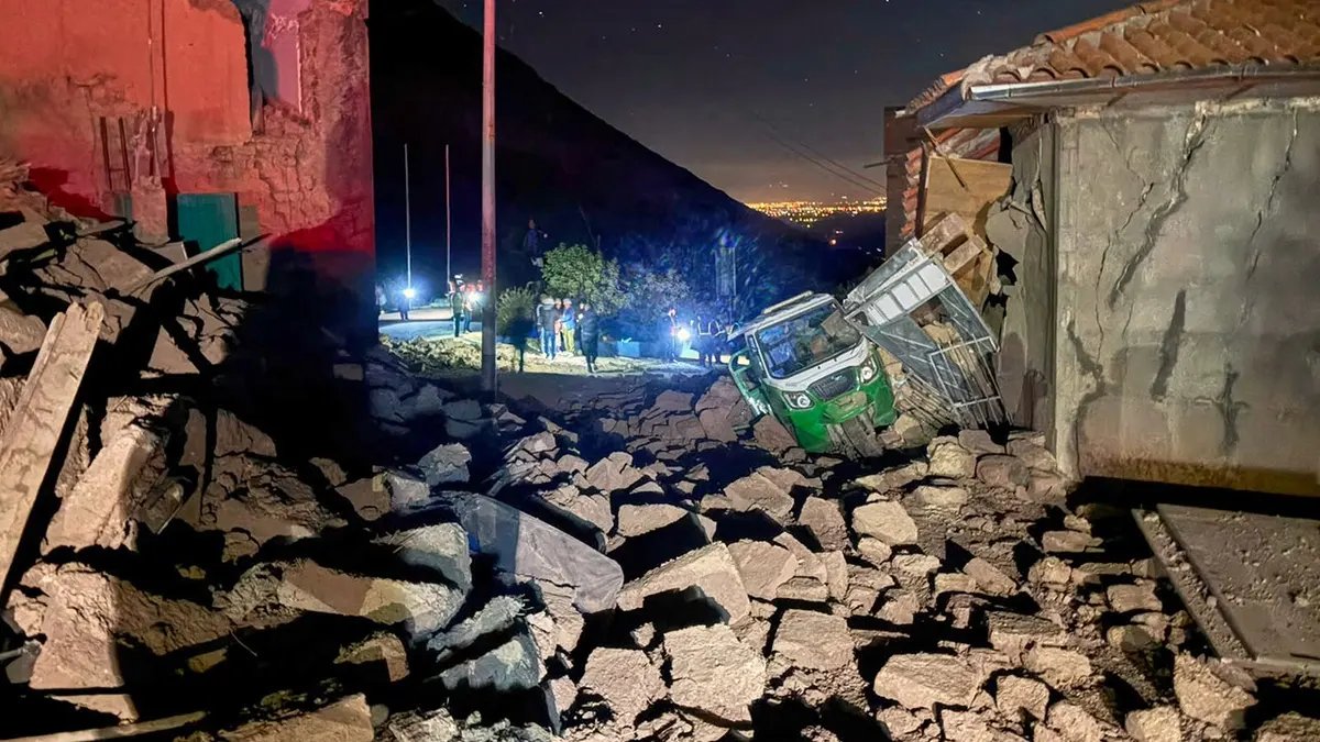 Five Dead and Hundreds Displaced After Magnitude 5.5 Earthquake Strikes Central Peru 2 Motor tricycle sits amid debris after homes collapse in Pumpuya, Peru.