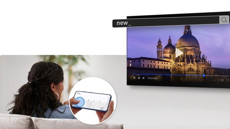 Woman controls wireless Samsung DeX instance on a TV