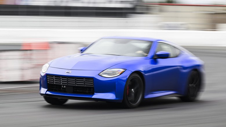 2027 Nissan Z Nismo First Drive: The Manual Gearbox Saves Its Soul 3 2027 Nissan Z Nismo w/ manual transmission blue front 3/4