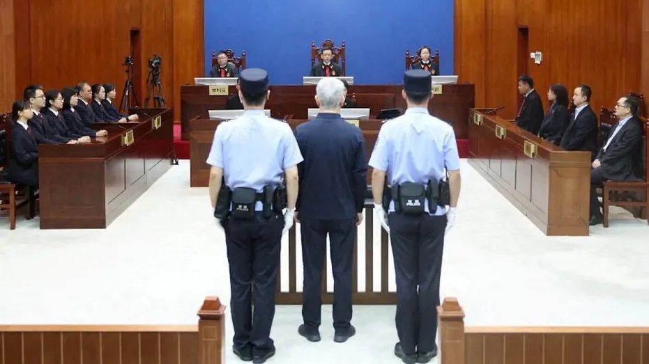 Hui Ka Yan, the founder of China's Evergrande Group stands in court