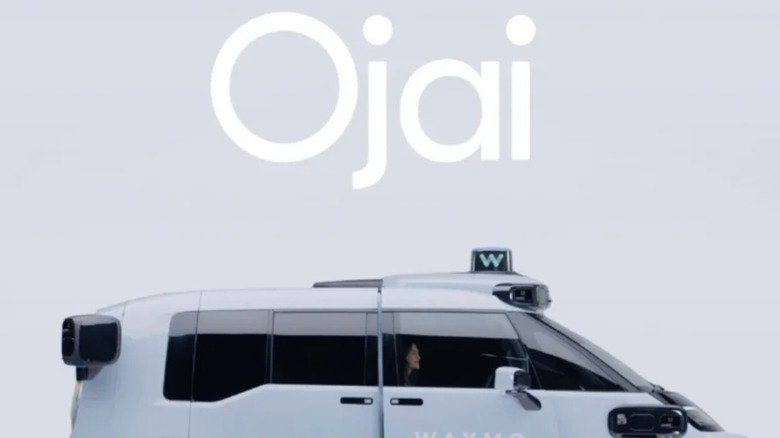 Waymo Opens Custom Ojai Driverless Vans to All Riders in San Francisco, Los Angeles, and Phoenix 2 Promotional image of the upper half of the passenger side of a pale blue Waymo Ojai driverless van.