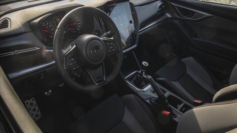 2026 Subaru WRX Base First Drive: Performance Value Purified 9 A look in the driver's door at the dashboard and driver's seat in the WRX Base