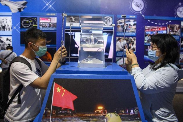 Lunar soil samples are on display at the National Museum of China in Beijing, May 26, 2021. (Photo by Weng Qiyu/People's Daily Online)