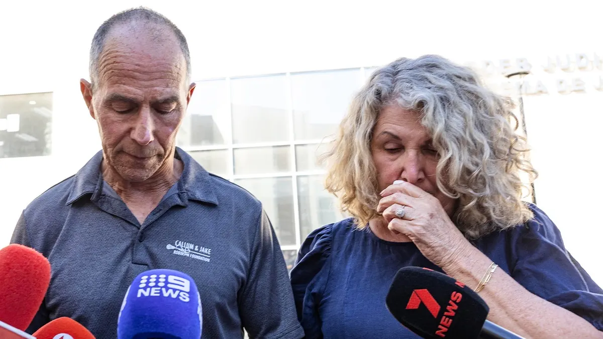 Debra and Martin Robinson, parents of Australian brothers Callum and Jake Robinson, pause during a news conference after the trial of the men accused of murdering the brothers and an American friend, in Ensenada, Mexico, Friday, Oct. 9, 2026.
