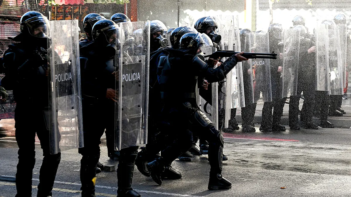 Albania police fire on protesters