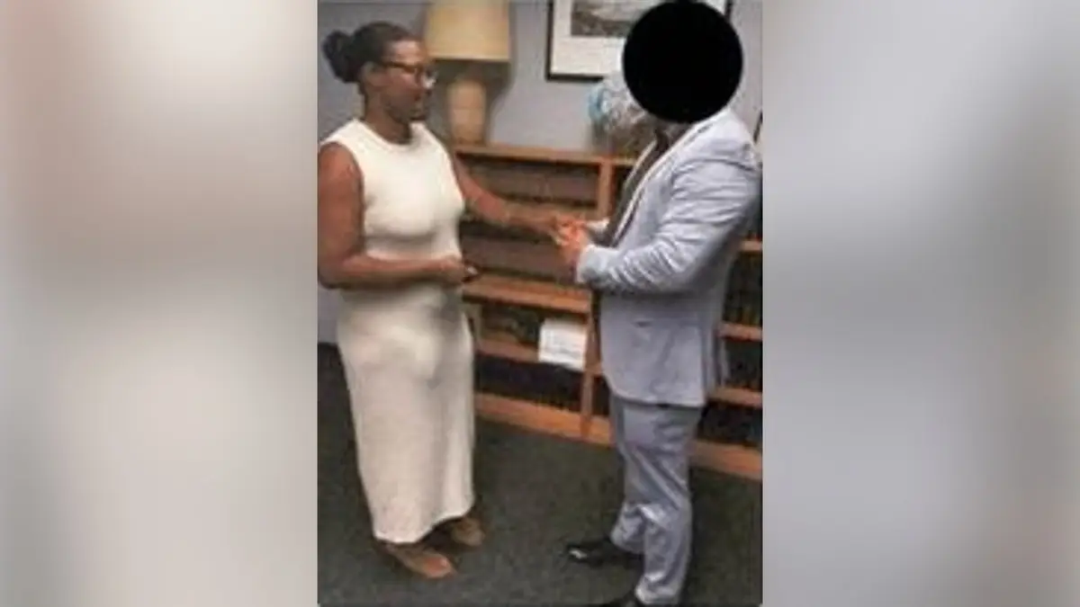 Erica Daniels, another alleged co-conspirator, marrying an illegal immigrant from Brazil.