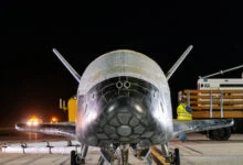 The U.S. Space Force X-37B spaceplane on a runway after landing at Vandenberg Space Force Base on March 7, 2025