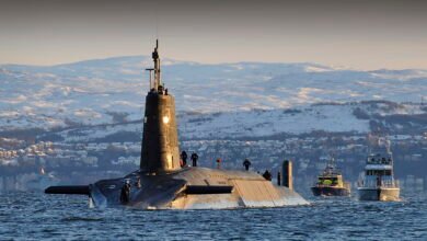 HMS Vanguard submarine returning to Faslane naval base in Scotland