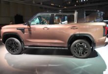2026 Mitsubishi Pajero in Armor Copper at its Tokyo reveal event, left side view