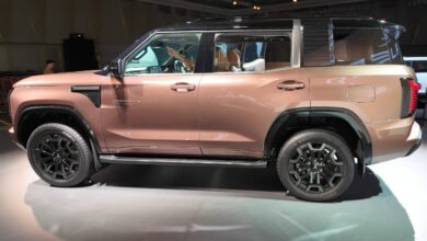 2026 Mitsubishi Pajero in Armor Copper at its Tokyo reveal event, left side view