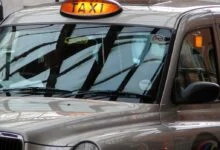 FOR HIRE signage on a London hackney carriage at Marylebone station