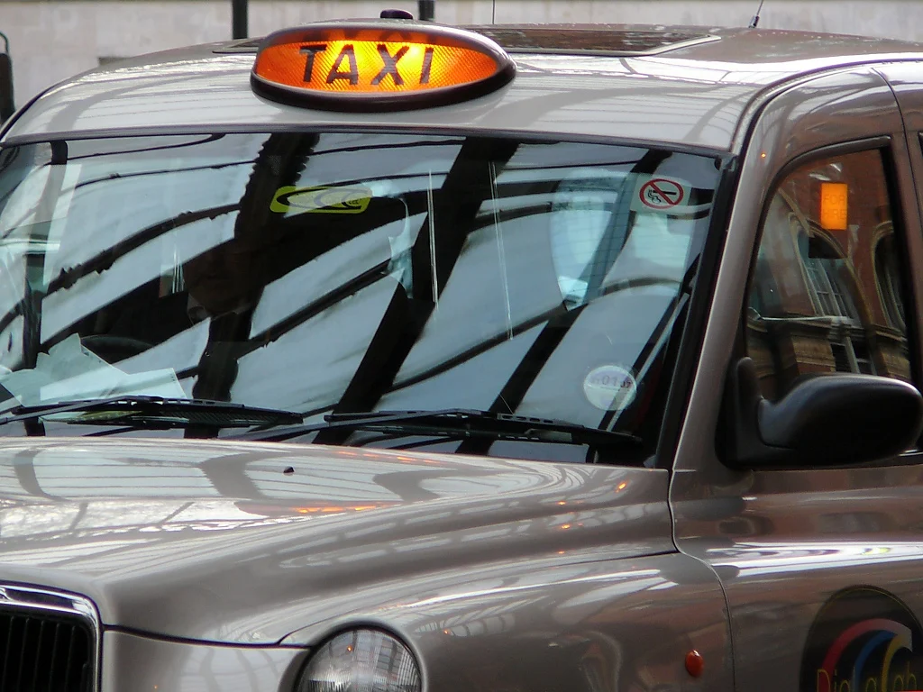 FOR HIRE signage on a London hackney carriage at Marylebone station