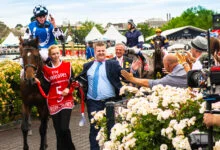 Horses racing at Flemington on Melbourne Cup day