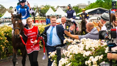 Horses racing at Flemington on Melbourne Cup day