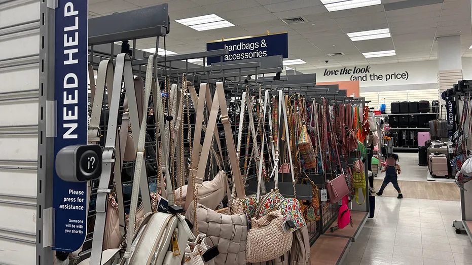 Press button for assistance in Handbag department of Marshalls