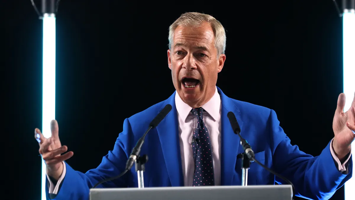 Reform leader Nigel Farage addresses those gathered at Holiday Inn on June 29, 2026 in Norwich, England.