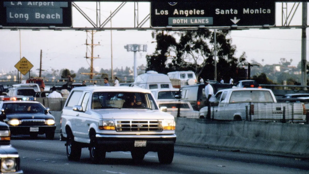 O.J. Simpson in a white Ford Bronco during a slow-speed chase on the 405 freeway in Los Angeles.