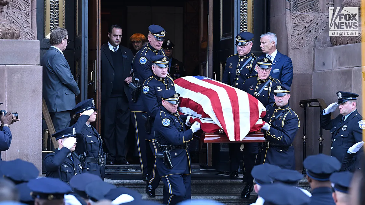 Law enforcement officials mourn for slain Philadelphia cop