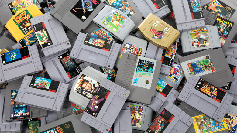 An assorted pile of retro game cartridges.