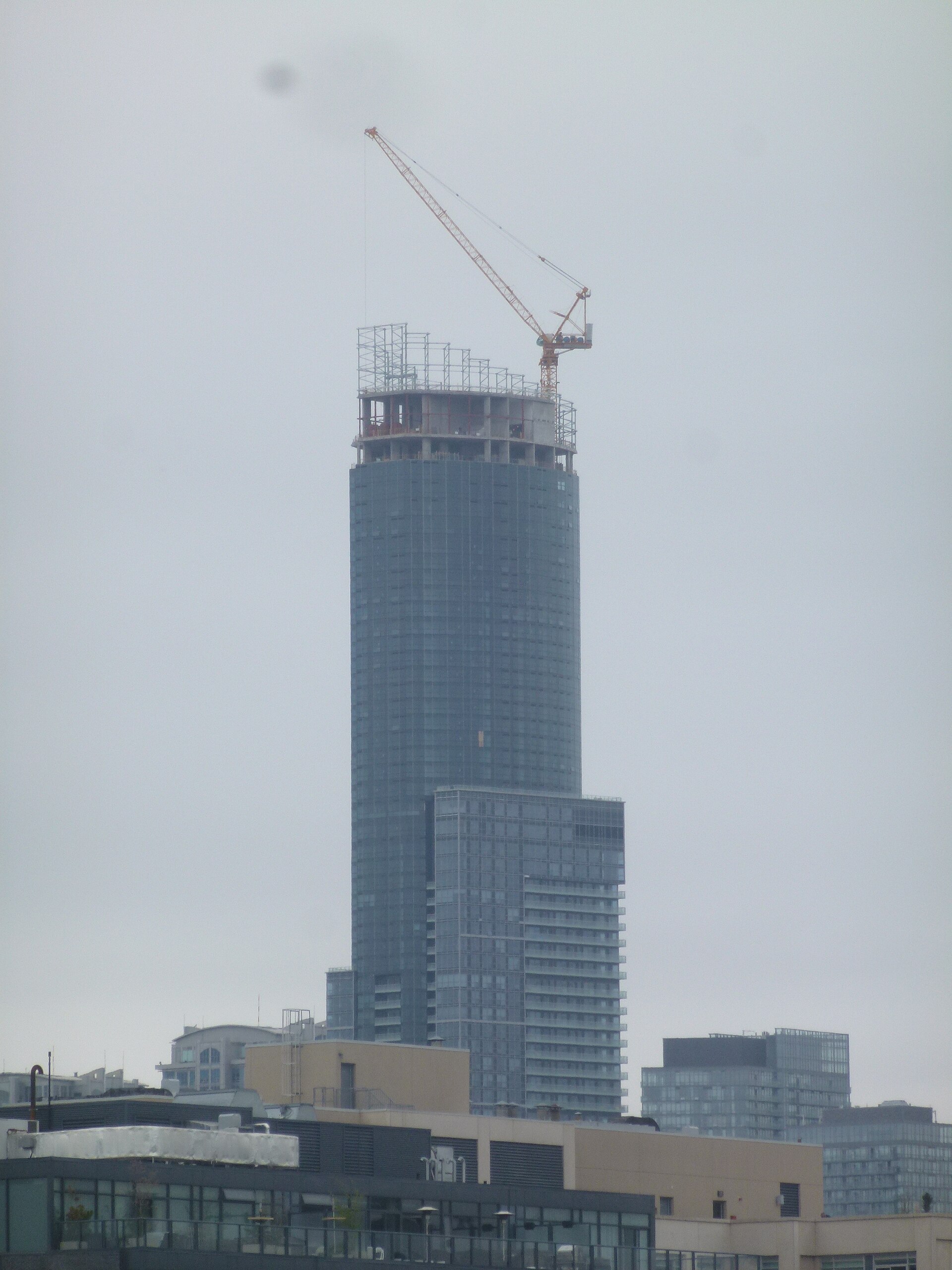 Tower crane over a high-rise under construction in Toronto